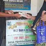 BLT-Dana Desa Perdana Tahun 2023 Desa Tenggulang Baru Sesuai Permenkeu RI Nomor 201 Tahun 2022