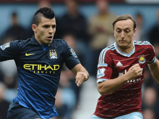 Sergio Aguero dari Manchester City beraksi dengan Mark Noble dari West Ham United pada tanggal 25 Oktober 2014 (c) IMAGO