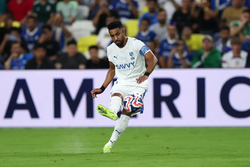 Salem Al-Dawsari merayakan gol pembuka yang mengantar Al Hilal ke perempat final. (Foto  FIFA)
